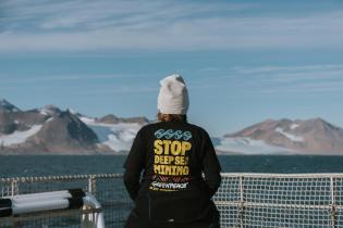 Scuba Diver with 'Stop Deep Sea Mining' T-shirt on Arctic Sunrise in the Arctic