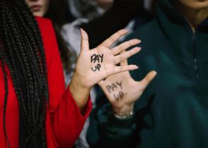 "Pay Up" Action Message at COP29 in Baku