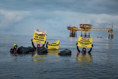 Project North Sea: Activists Swim to Oil Rig in Denmark